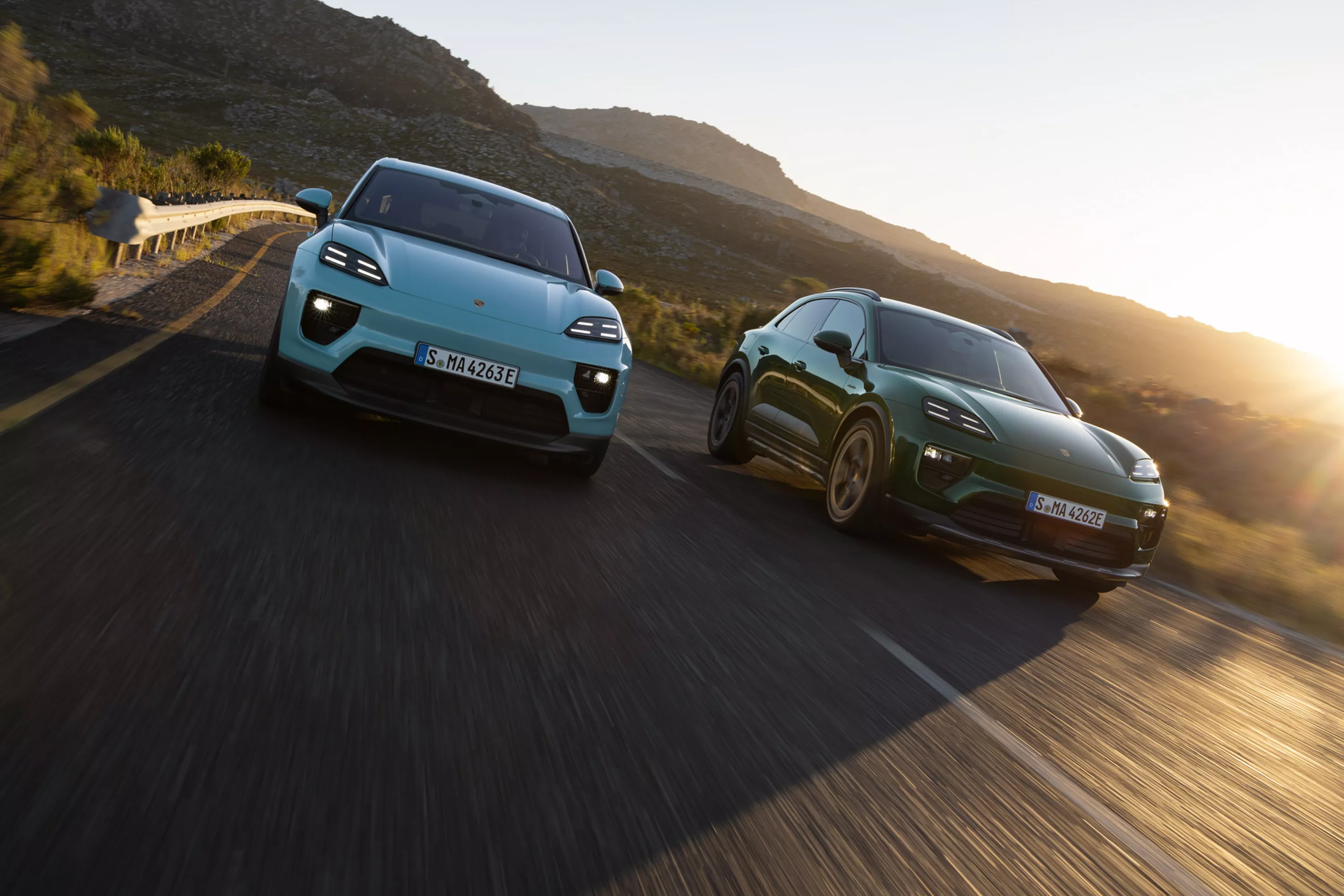 2 porsche on the street