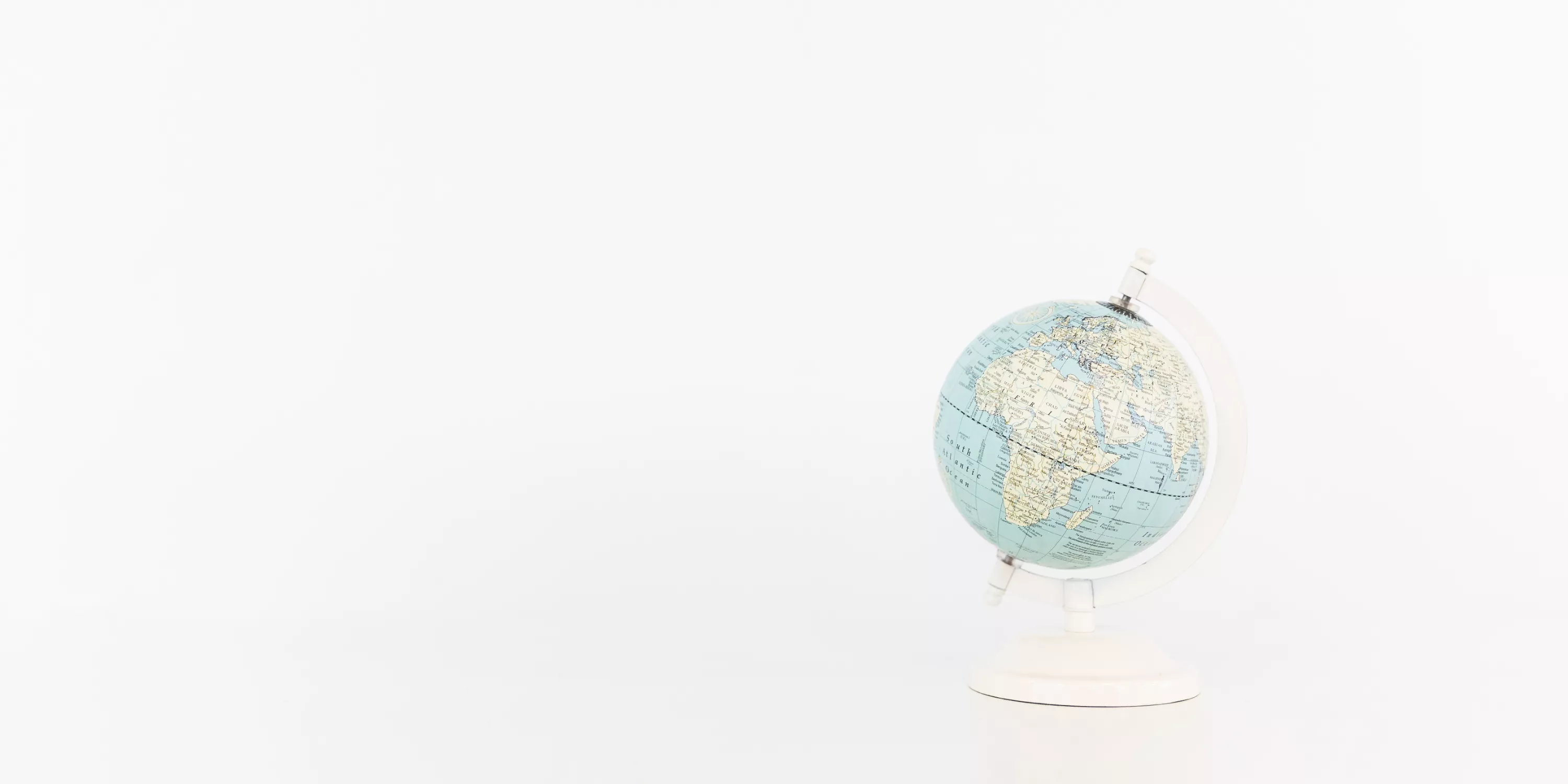 The picture shows a globe with a white background.
