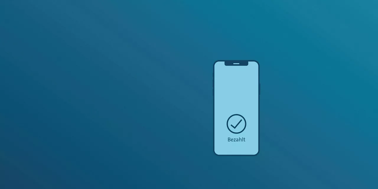 Smartphone mit Bezahlt-Button