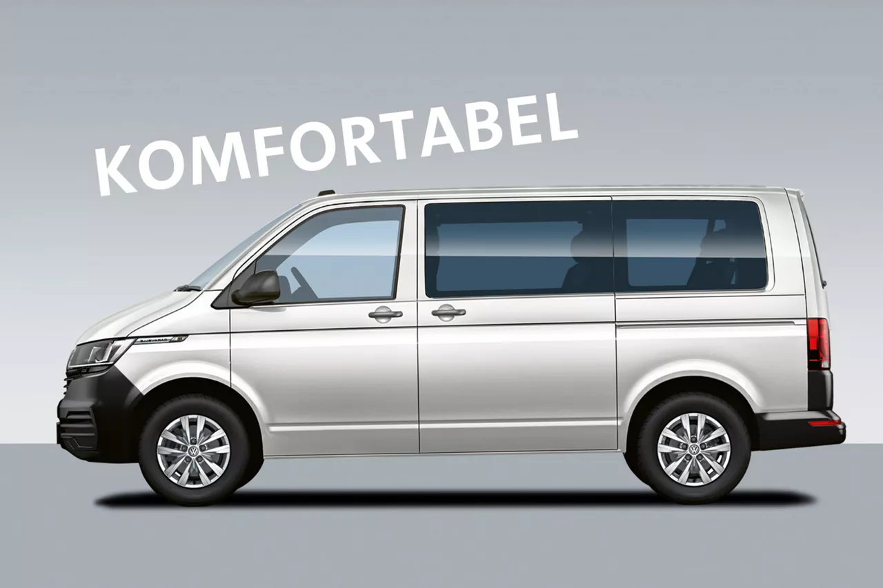 vw-caravelle-vor-grauem-hintergrund-mit-schriftzug-komfortabel-dadrüber