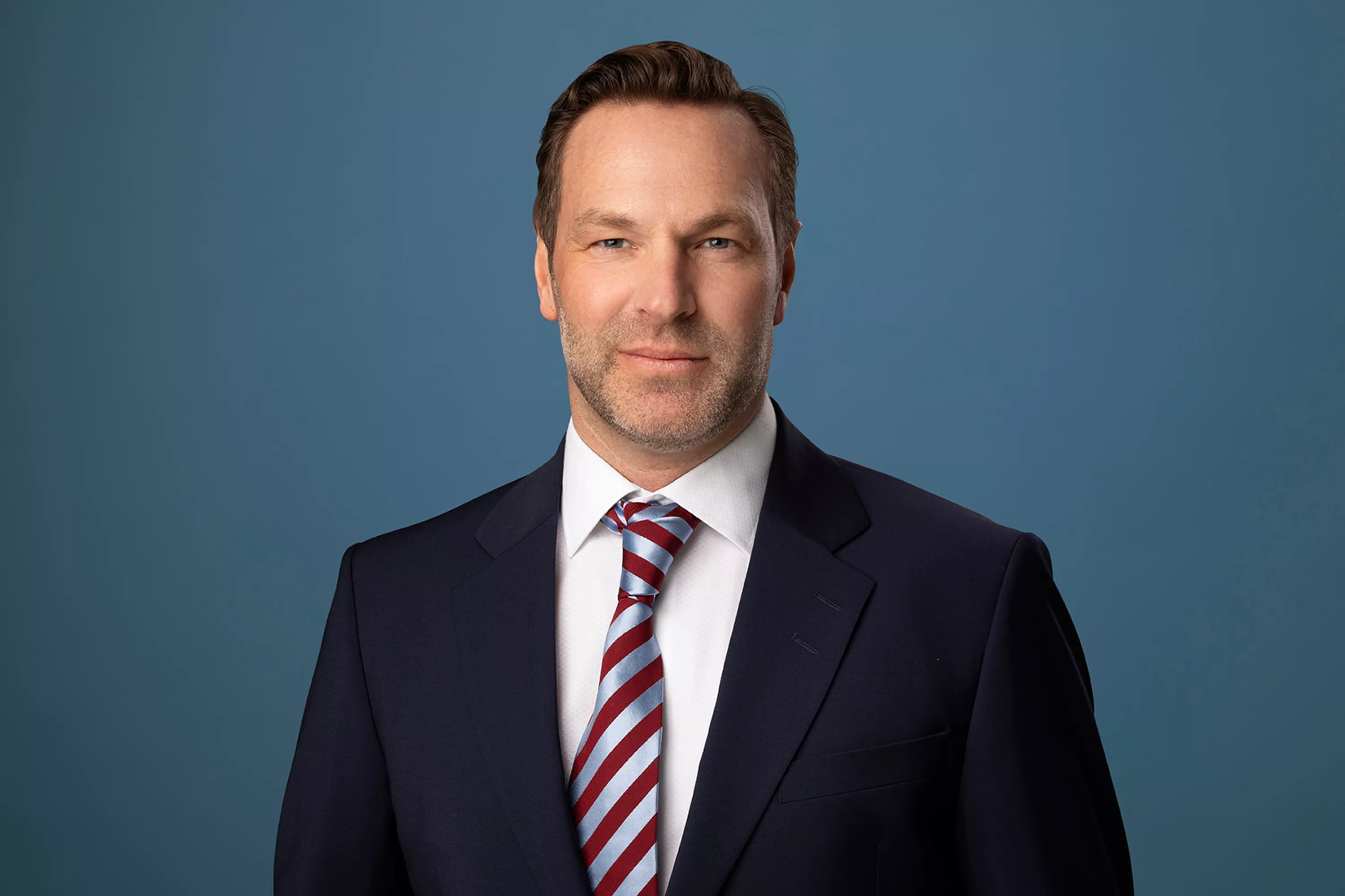 Porträttbild av Patrik Lindroth, VD Volkswagen Finans.